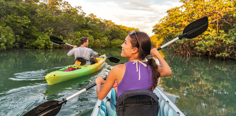 Couple kayaking in Anna Maria Island mangroves