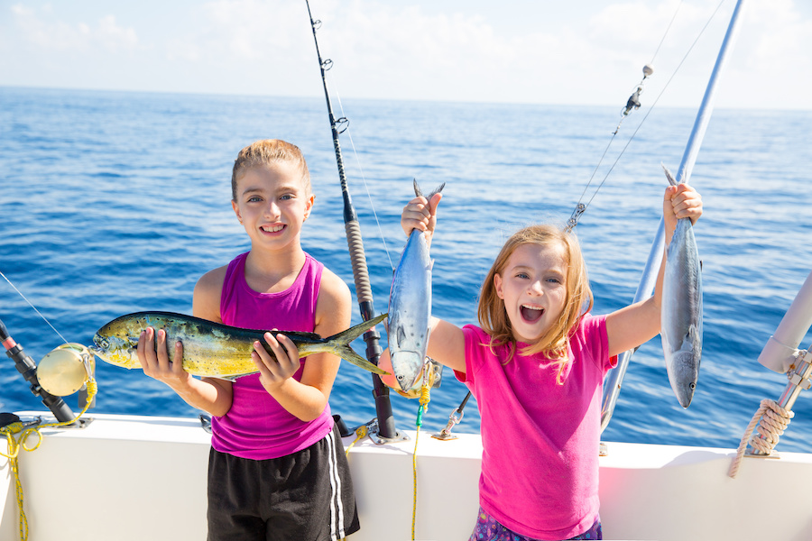 Happy kids fishing on Anna Maria Island